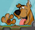 Ajudar Scooby a comer os alimentos que passam pela máquina